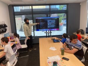 Instructor teaching Minecraft Modding Camp