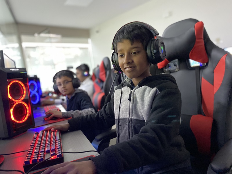 A child competes in an iCode sponsored gaming event