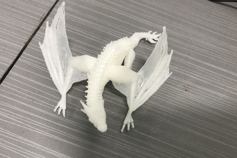 A detailed 3D-printed dragon made by a student